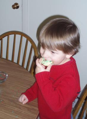 my son eating one of the cookies